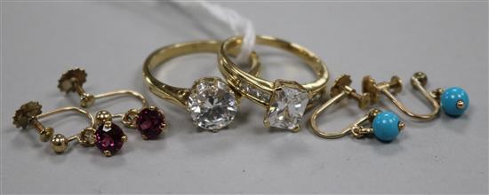 A pair of turquoise and 9ct gold earrings, a similar pair of garnet earrings and two 9ct gold stone-set rings